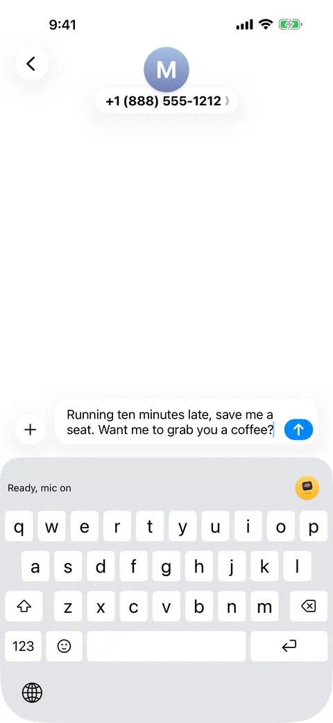 The message typed in: Running ten minutes late, save me a seat. Want me to grab you a coffee?